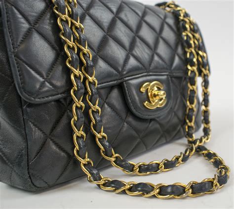 chanel black purse with chain|Black Chanel bag gold chain.